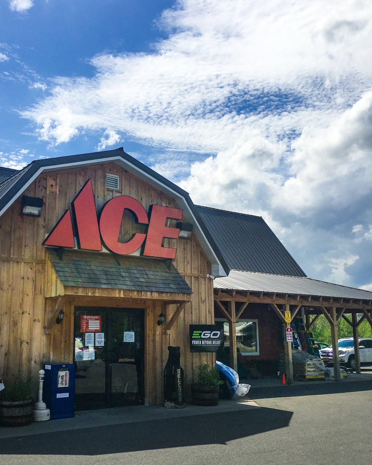 Hatchet Hardware's Palatine Bridge storefront. The ACE logo is prominently displayed on the awning above the entrance.